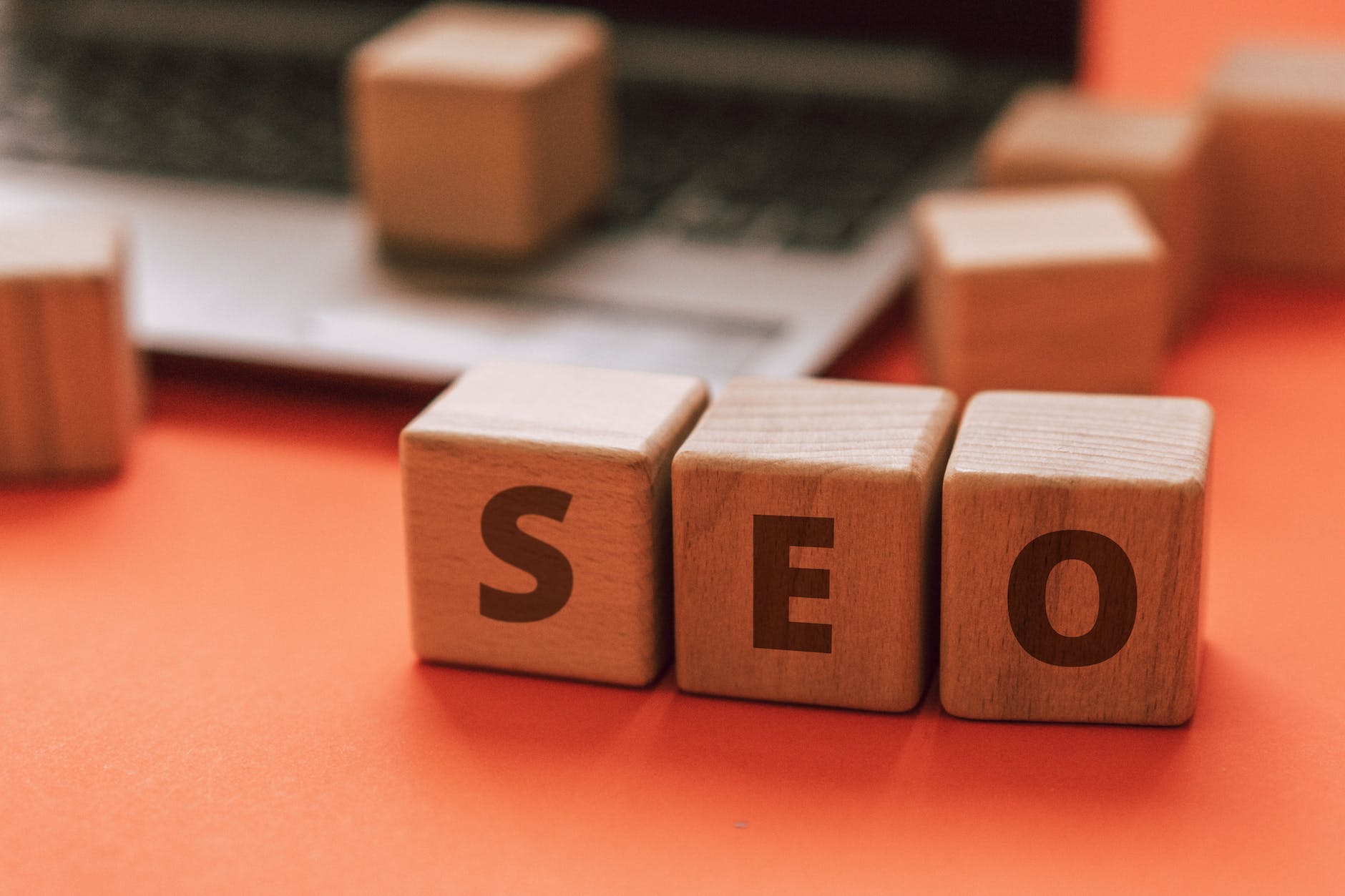 letters on the wooden blocks SEO in how to start a medical blog