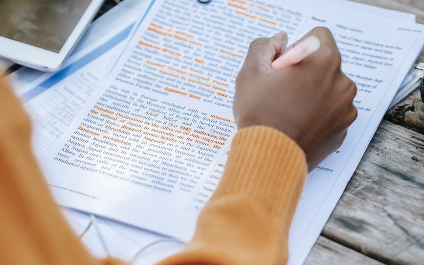 person outlining information in how to write a medical blog